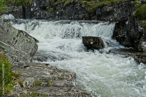 Djävulshålet Ravin waterfalls near Tossåsen in northern Sweden photo