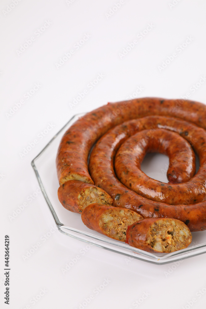 Local Northern Thai food , Northern Thai spicy sausage street food isolated in white background Local Northern Thai food , Northern Thai spicy sausage street food isolated in white background
