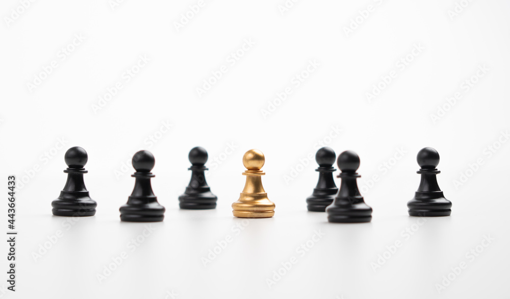 Golden chess pawn standing with the team to show influence and empowerment. Concept of business leadership for leader team, successful competition winner and Leader with influence Golden chess pawn standing with the team to show influence and empowerment. Concept of business leadership for leader team, successful competition winner and Leader with influence