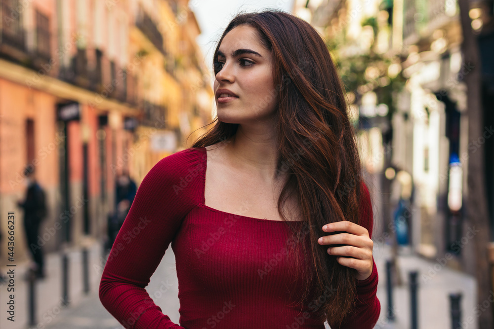 Attractive and beautiful young woman looking away Attractive and beautiful young woman looking away