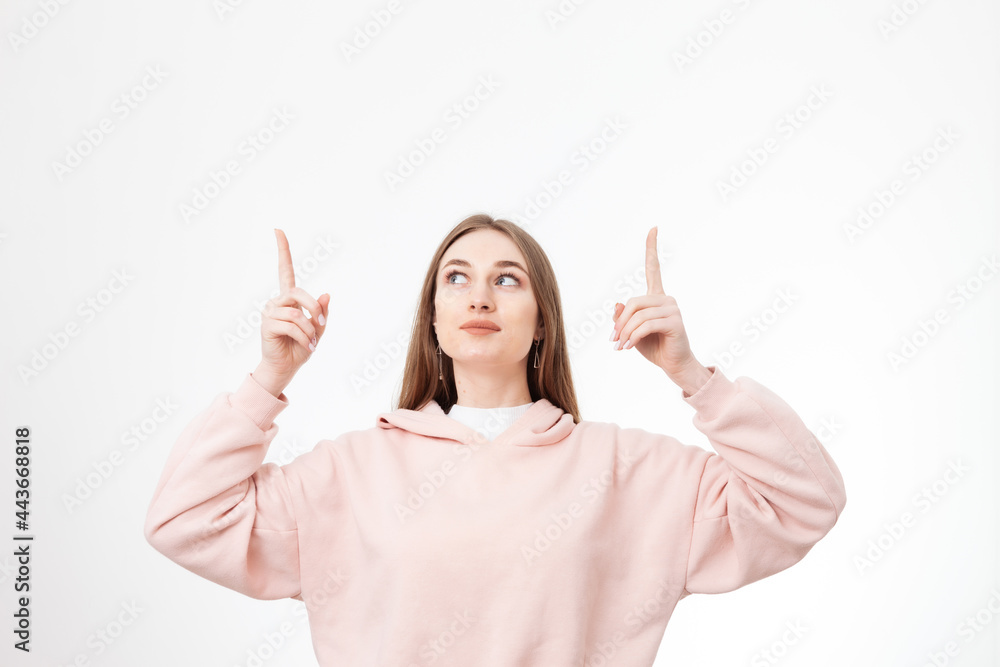 Morlodic attractive europloid woman showing thumbs up on copy space isolated on white background Morlodic attractive europloid woman showing thumbs up on copy space isolated on white background