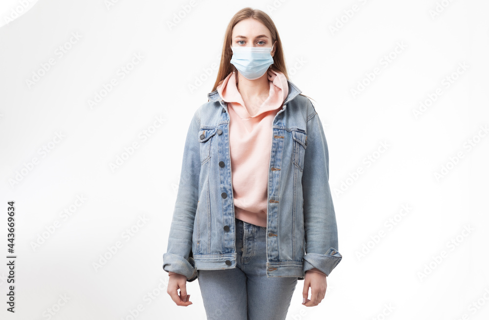 Young woman in medical mask isolated on white background Young woman in medical mask isolated on white background