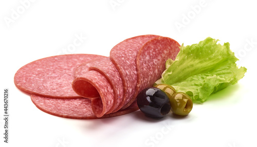 Thin salami sausage slices, isolated on white background.