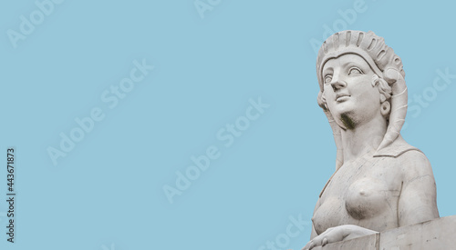 Banner with statue of beautiful Egyptian sphinx at Obelisk in historical downtown of Potsdam, Germany, with copy space and blue sky solid background.