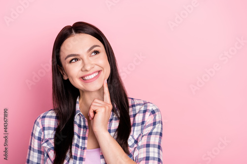 Photo portrait of curious girl thoughtful got idea isolated on pastel pink color background © deagreez