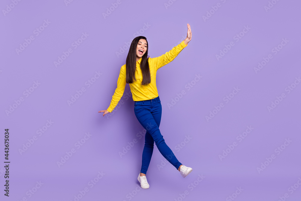 Full size photo of funky happy charming young woman dance weekend enjoy isolated on purple color background