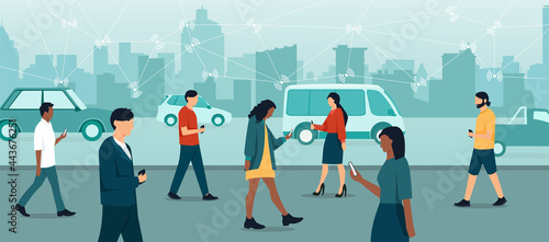 Vector of a crowd of people walking on a big city street using mobile smartphones