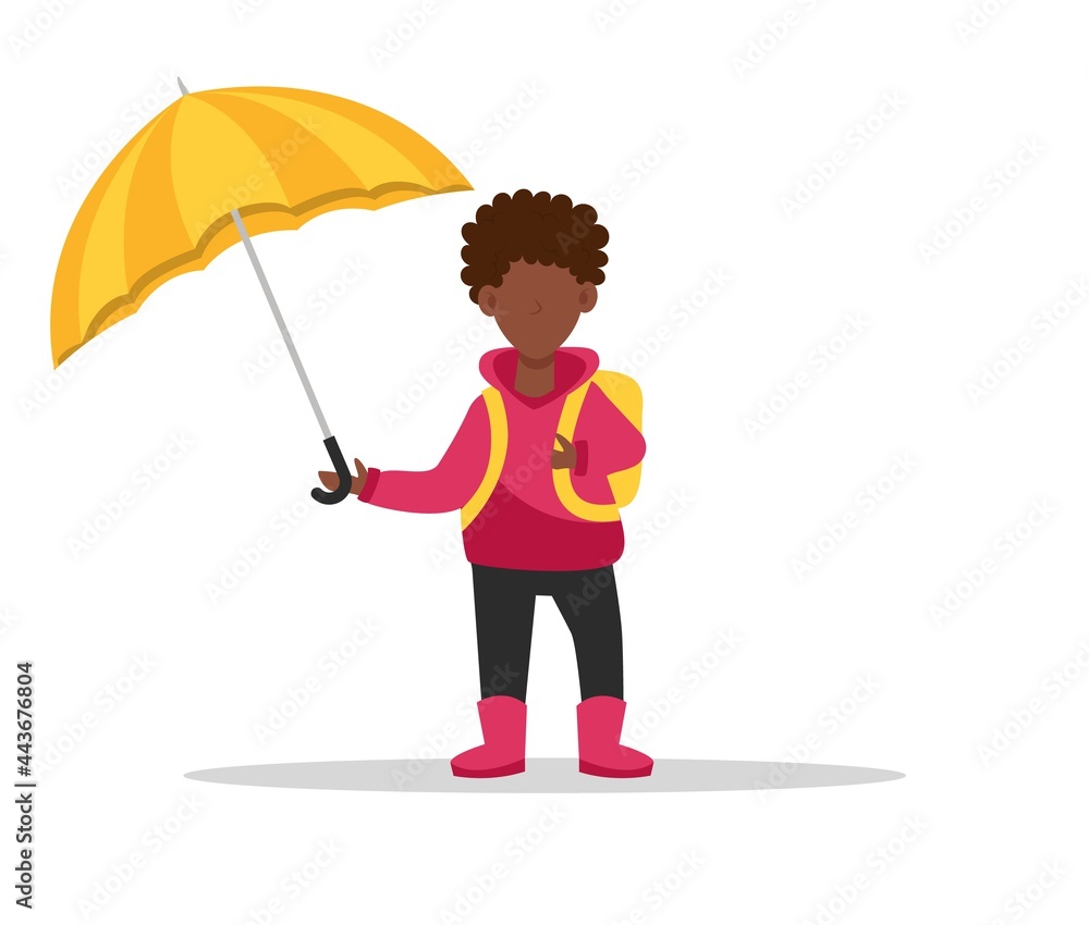 African-American boy under an umbrella. Back to school. A child with a backpack. Isolated on a white background. Autumn concept. African-American boy under an umbrella. Back to school. A child with a backpack. Isolated on a white background. Autumn concept.