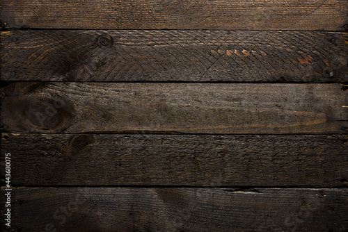 Rustic wooden table background made from old planks top view.