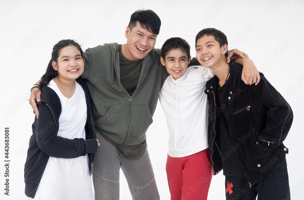 Fototapeta premium Portrait of a group of b-boying students posing as the teacher suggested on white background. Young student hip-hop dancer.