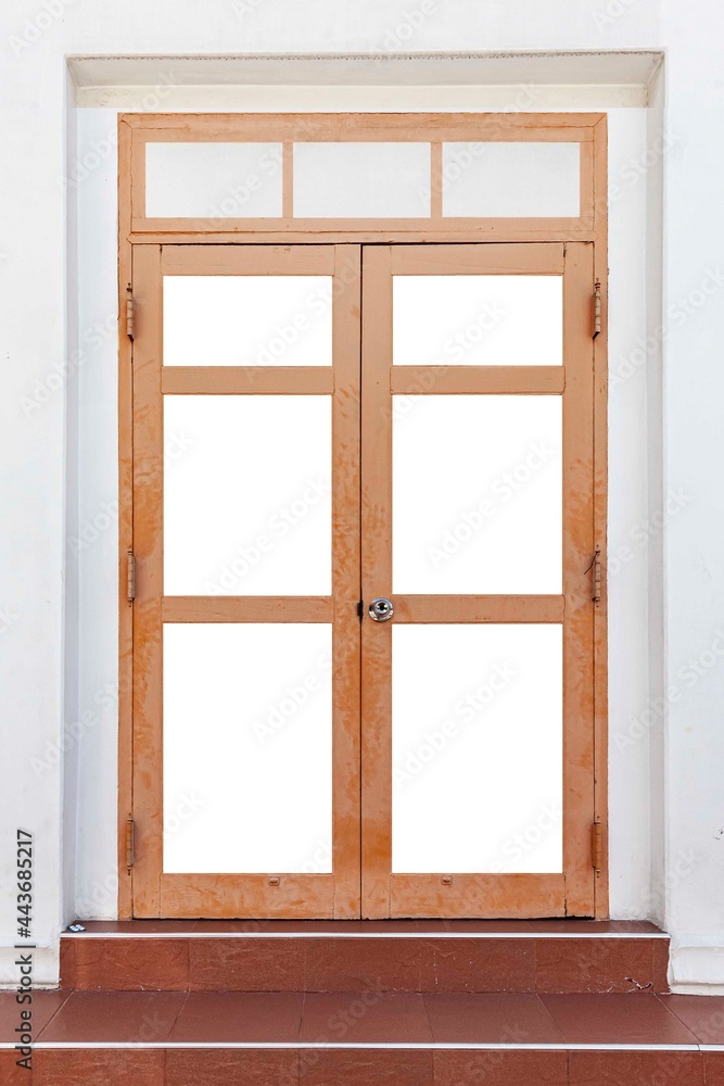 Obraz premium Vintage brown painted wooden door frame isolated on a white background