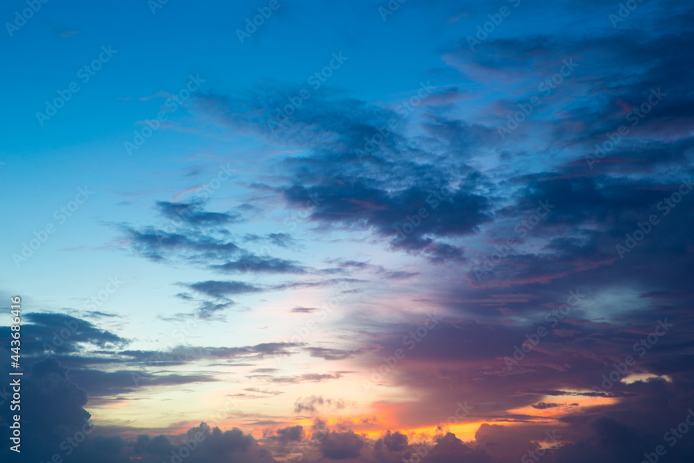 Sunset with sun rays, sky with clouds and sun