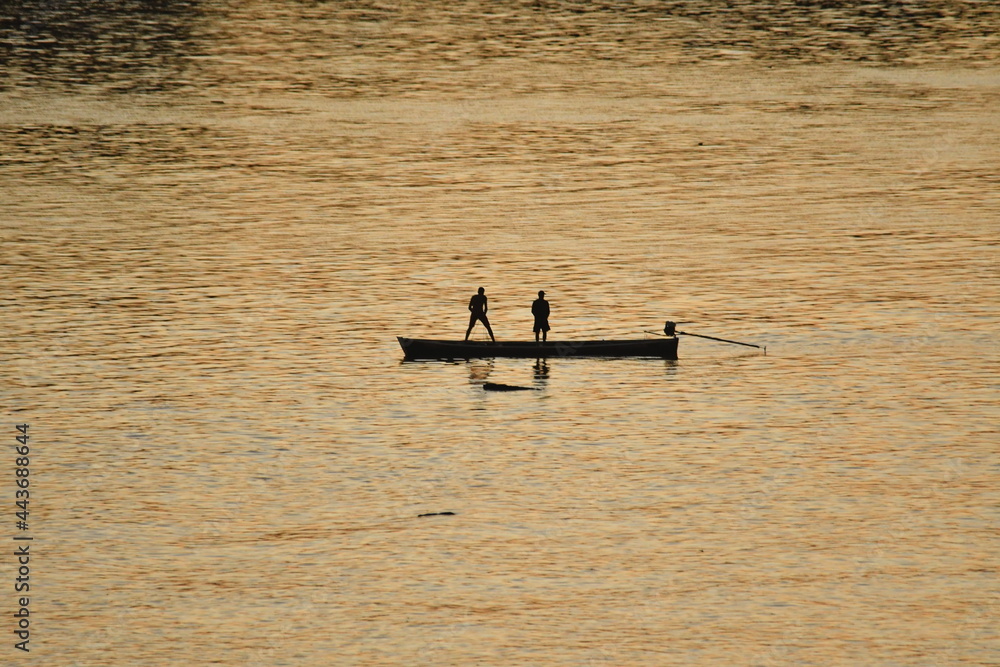 fishermen on the river