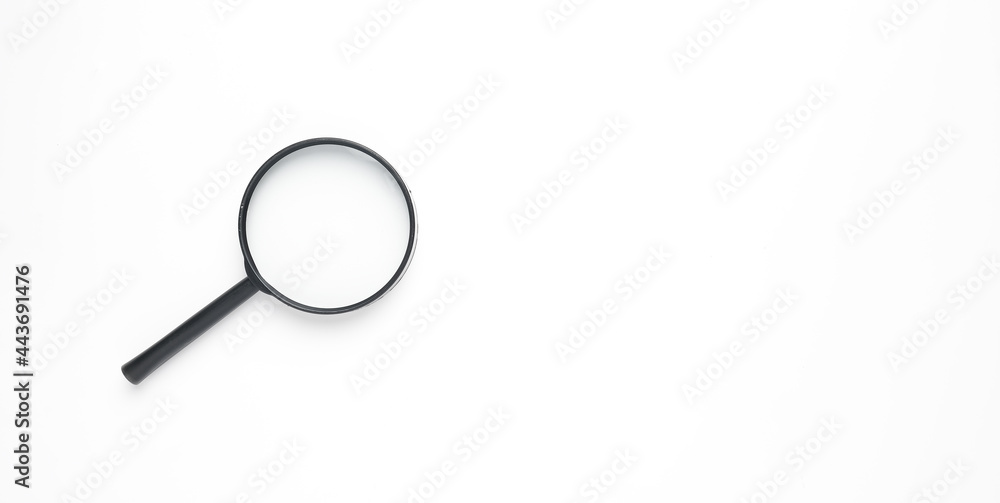 Magnifying glass on isolated white background and copyspace Magnifying glass on isolated white background and copyspace