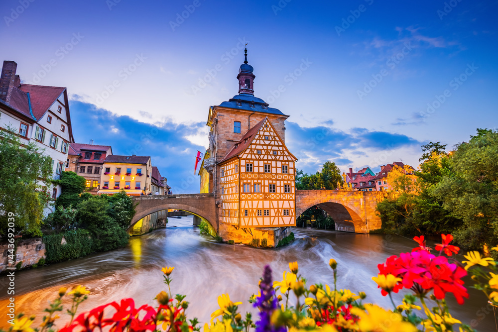 Bamberg, Germany. Town Hall of Bamberg (Altes Rathaus) with two bridges over the Regnitz river. Upper Franconia, Bavaria.