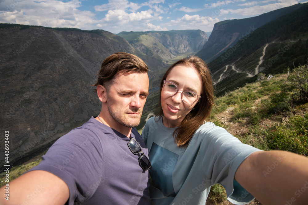 Couple selfie on the top of Altai mountain