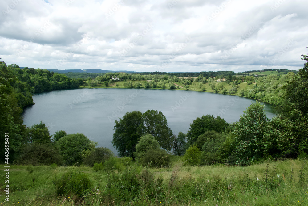 Weinfeldermaar (Totenmaar) on a cloudy day in the summer Weinfeldermaar (Totenmaar) on a cloudy day in the summer