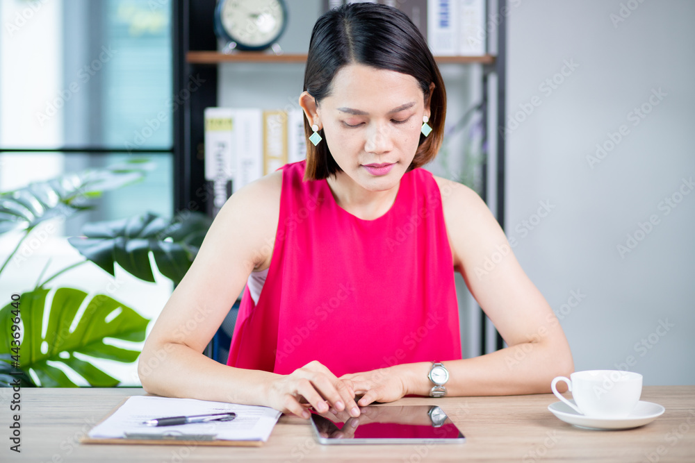 Happy beautiful woman working on wooden table with laptop and coffee cup. at work at home work from home concept
Happy beautiful woman working on wooden table with laptop and coffee cup. at work at home work from home concept