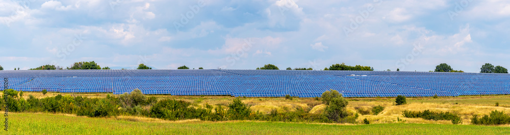 Banner of solar panels at hills against the sky. Industry concept Banner of solar panels at hills against the sky. Industry concept