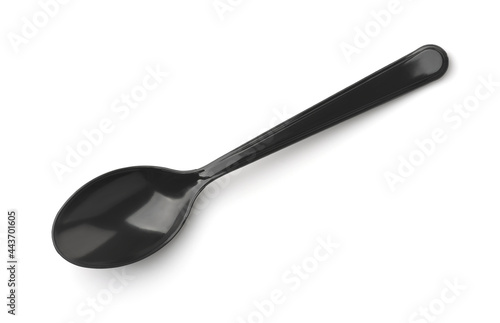 Top view of black plastic disposable spoon