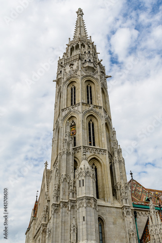 Details of the Matthias Church (Mátyás Templom) that is a Roman Catholic church located in Budapest, Hungary, in front of the Fisherman's Bastion at the heart of Buda's Castle District, in a sunny day