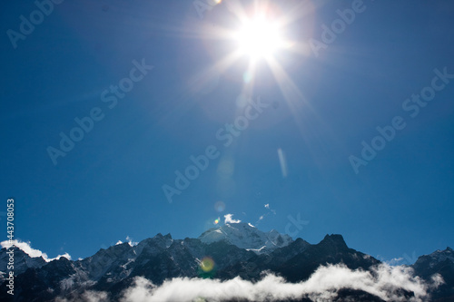 sun shining through the clouds