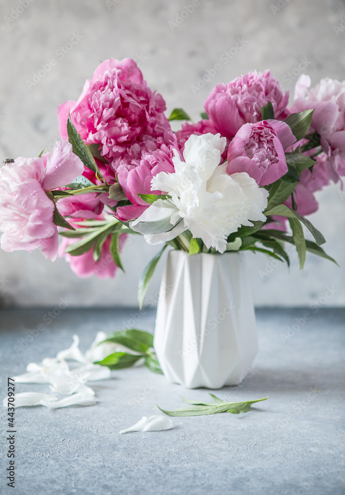Fresh Peony flowers in vase. bouquet close up. Stylish floral greeting card. Pink peony flower close-up with selective focus. Fresh Peony flowers in vase. bouquet close up. Stylish floral greeting card. Pink peony flower close-up with selective focus.