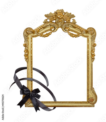 Golden frame with black mourning bow for paintings, mirrors or photo isolated on a white background. Design element with clipping path