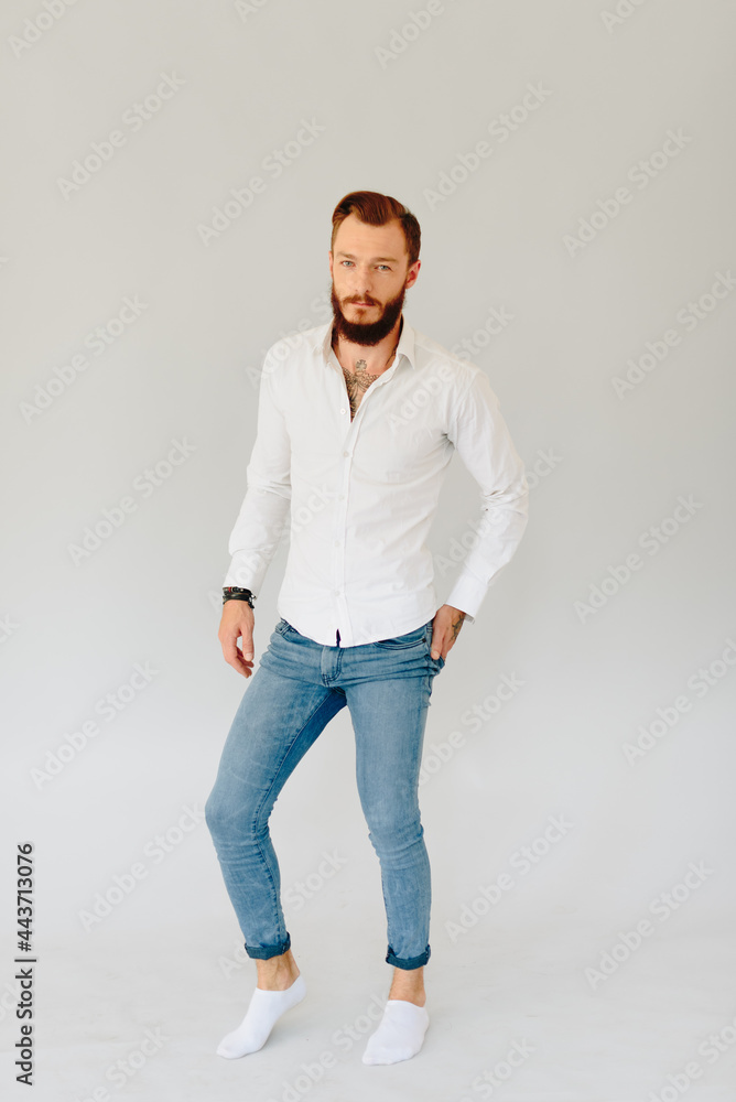 Studio photo of a beautiful young man with a beard Studio photo of a beautiful young man with a beard