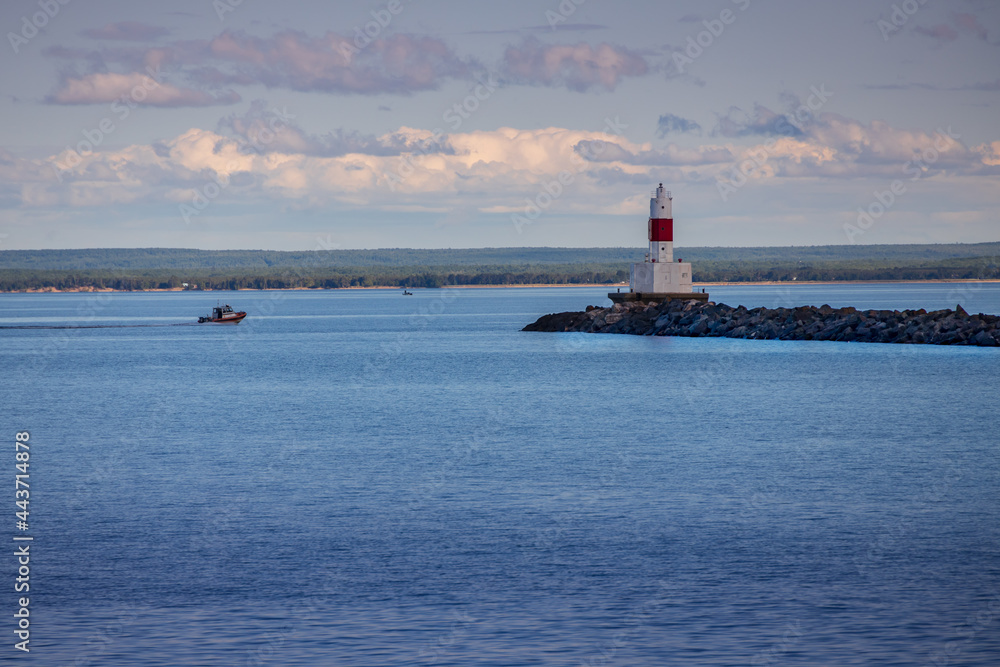 Presque Isle Harbor Lighthouse at the end of the breakwater at Lake Superior, Michigan, USA Presque Isle Harbor Lighthouse at the end of the breakwater at Lake Superior, Michigan, USA