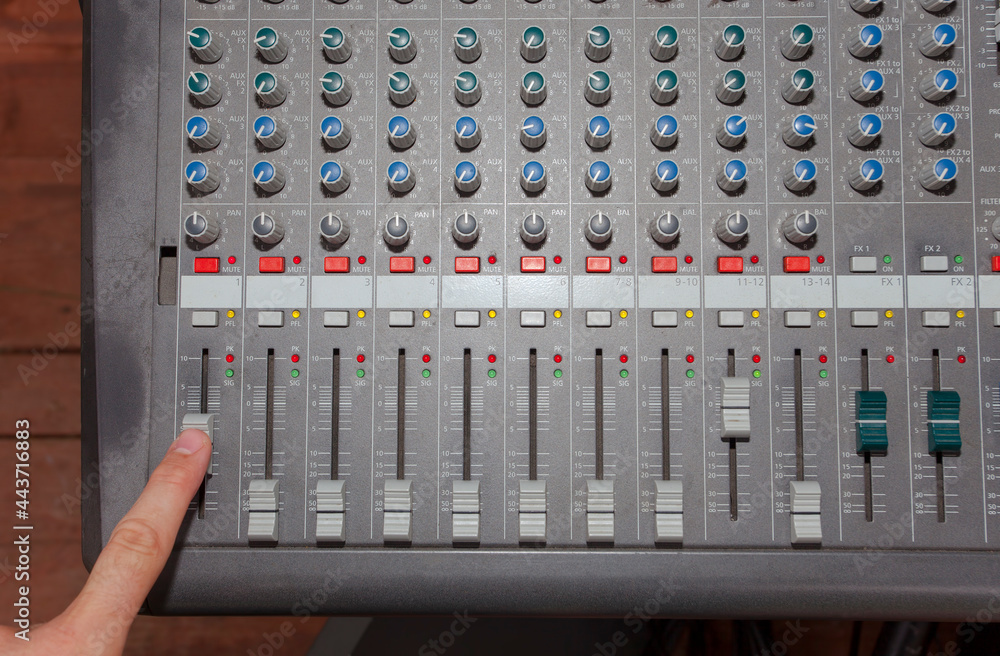 finger on volume. music equipment for sound equalizer finger on volume. music equipment for sound equalizer