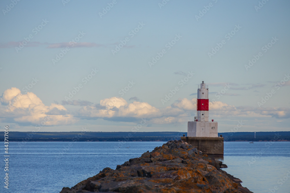 Presque Isle Harbor Lighthouse at the end of  the breakwater at Lake Superior, Michigan, USA