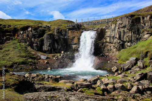 The small cascade above the main Faxi waterfall, seen on Laugarfellsvegur Waterfall Circle Hike, Laugarfell, Iceland photo
