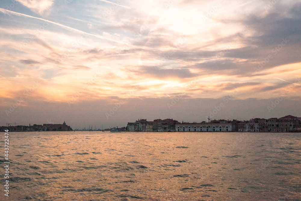 Beautiful view of the Venice lagoon on a sunset, Italy. Tourist background
