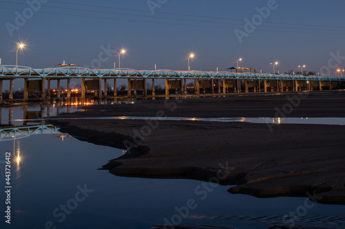 The Harmony Bridge in Bixby, Oklahoma at night, using long exposure photography.