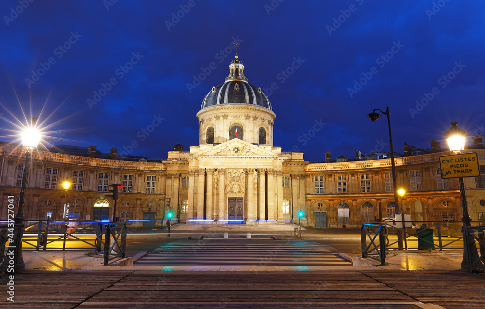 The view of French Academy and Arts bridge at night , Paris, France.