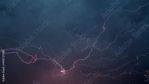 Lightnings in dark stormy sky