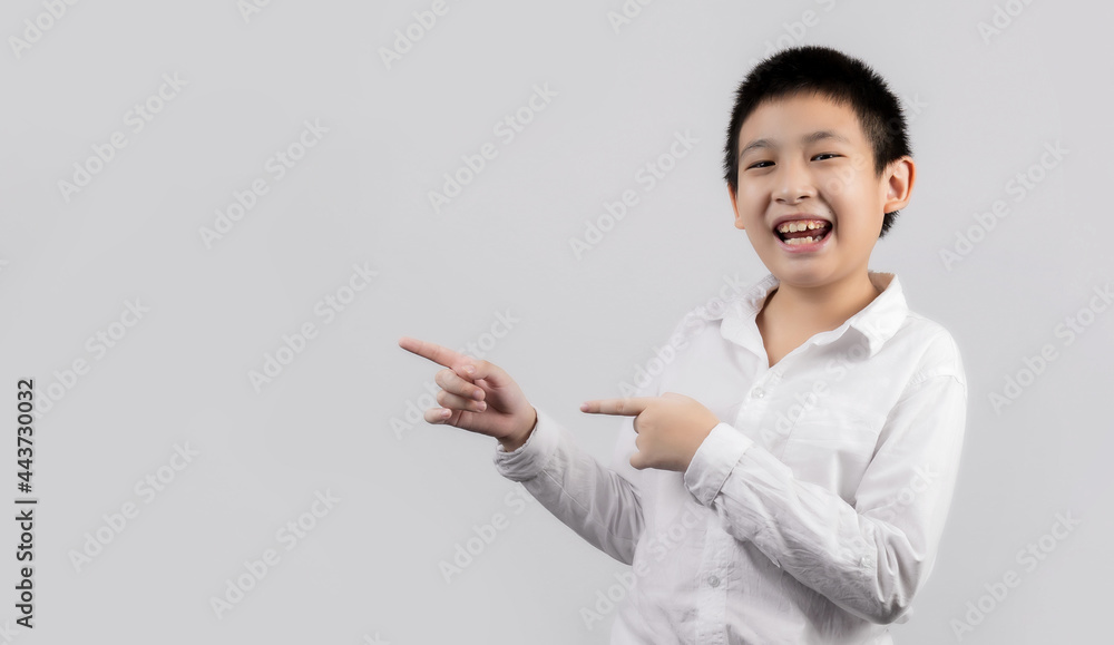 Asian boys studio portrait on gray background Asian boys studio portrait on gray background