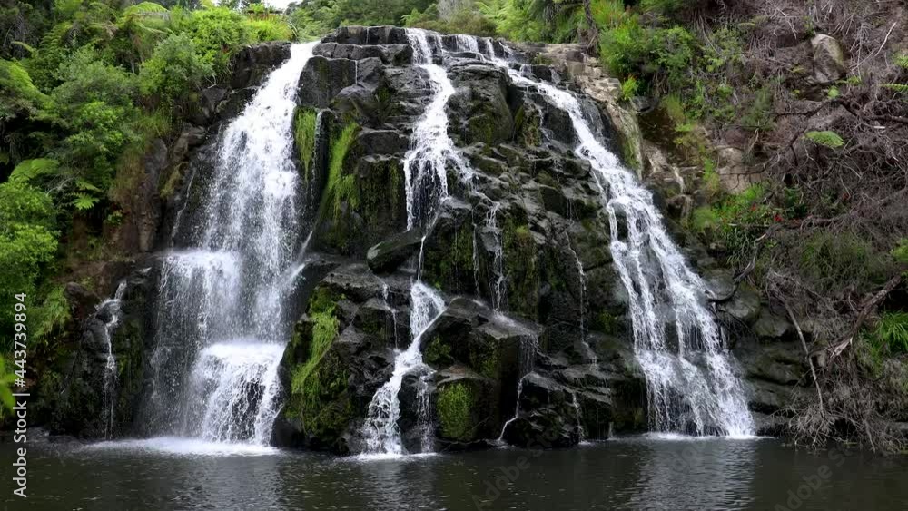 Slow wide revealing shot of Owharoa Falls near Karangahake Gorge in the Coromandel Peninsula of the North island of New Zealand Slow wide revealing shot of Owharoa Falls near Karangahake Gorge in the Coromandel Peninsula of the North island of New Zealand