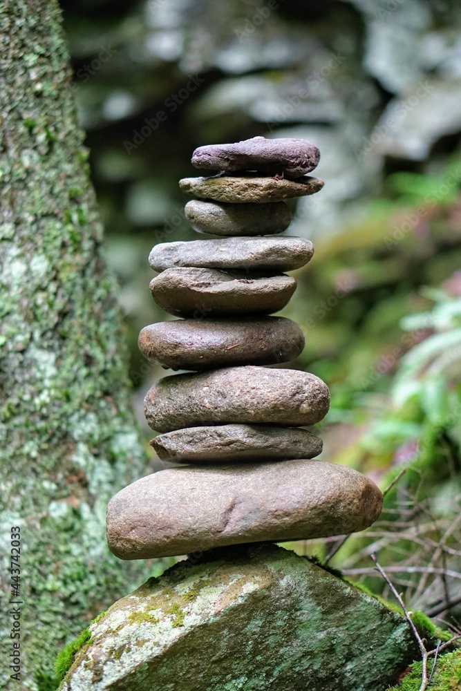 Stone Cairn on a Forest Hiking Trail Stone Cairn on a Forest Hiking Trail