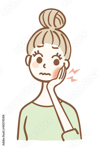 虫歯が痛む若い女性