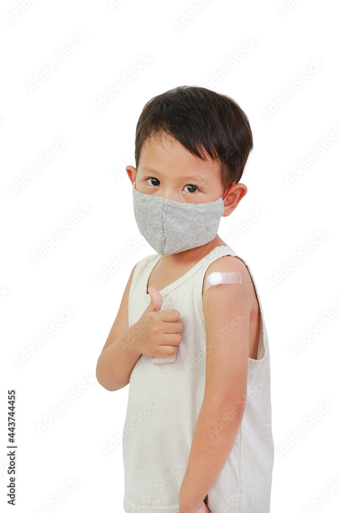 Boy showing arm with adhesive plaster, cotton from vaccinated. Asian little babay boy with plaster on the shoulder from the injection. Treatment of children patch. Vaccination concept Boy showing arm with adhesive plaster, cotton from vaccinated. Asian little babay boy with plaster on the shoulder from the injection. Treatment of children patch. Vaccination concept