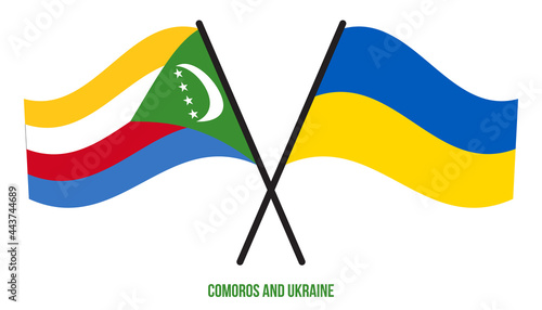 Comoros and Ukraine Flags Crossed And Waving Flat Style. Official Proportion. Correct Colors.