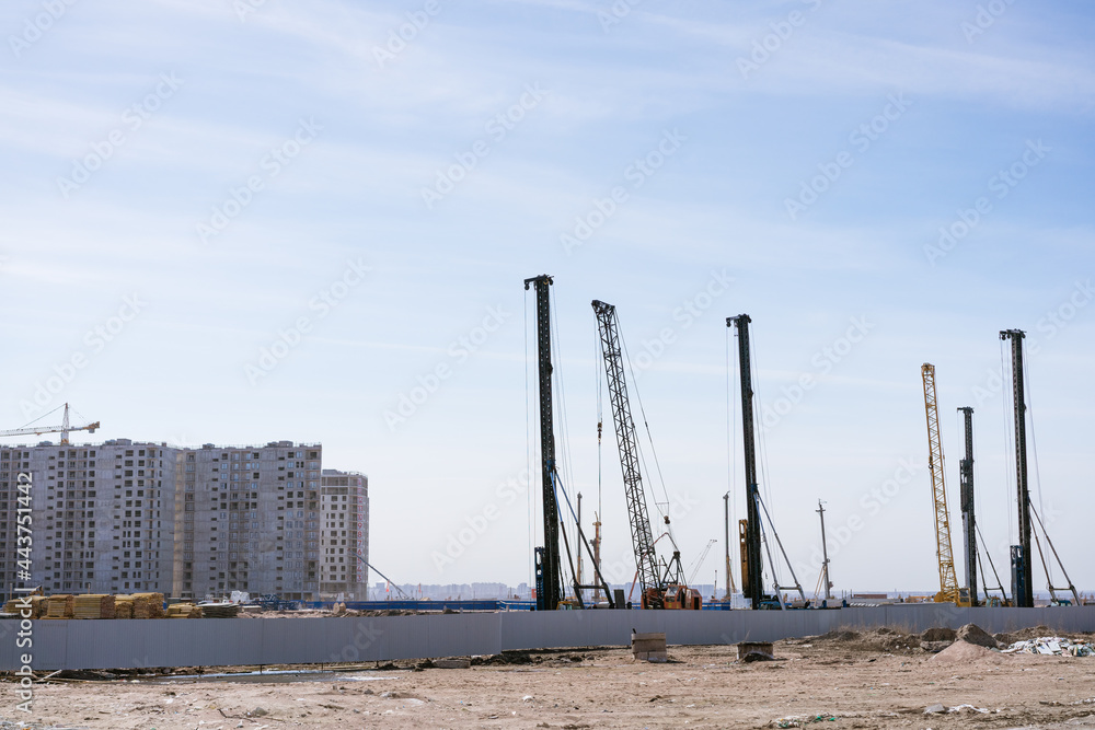 high-rise buildings under construction, development of new residential areas of the city