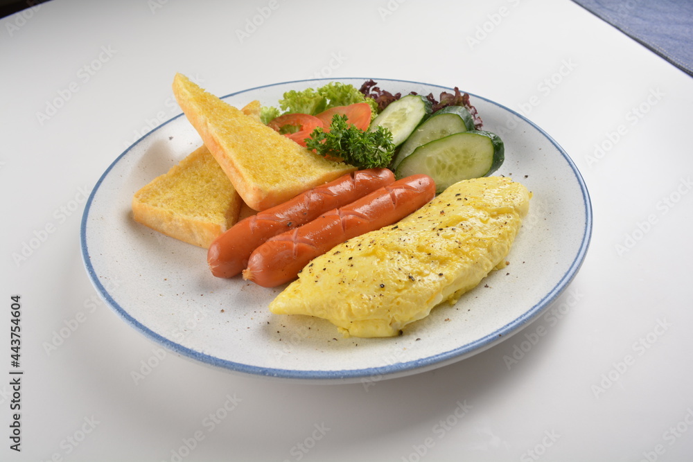 western big breakfast with butter toast, fried scramble egg, sausage, grill bacon, ham, omelette, bean and salad halal breakfast menu western big breakfast with butter toast, fried scramble egg, sausage, grill bacon, ham, omelette, bean and salad halal breakfast menu