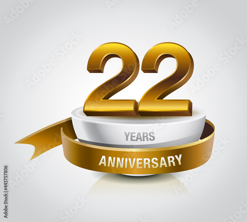22 years golden anniversary logo celebration with ring and ribbon.