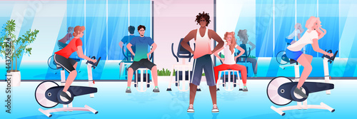 mix race people doing physical exercises fitness training aerobic workout healthy lifestyle concept