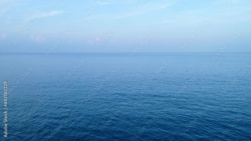 Beautiful Sea surface in summer season clouds and blue sky footage from drone aerial view High quality footage from drone camera Beautiful Sea surface in summer season clouds and blue sky footage from drone aerial view High quality footage from drone camera