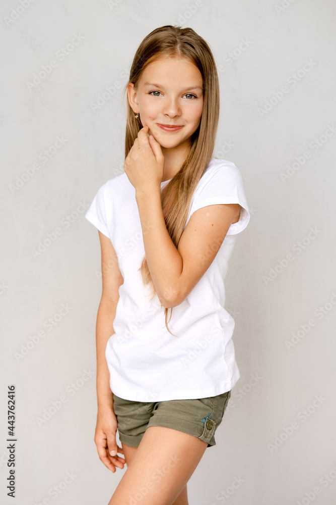 Portrait of teenager girl with hand near chin Portrait of teenager girl with hand near chin
