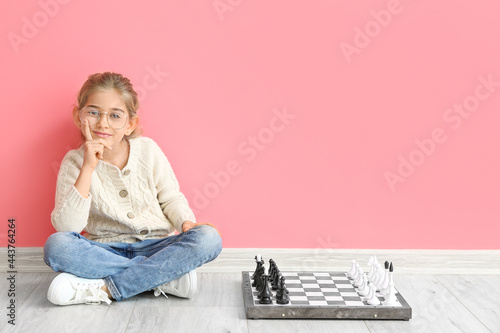 Cute little girl playing ch...
